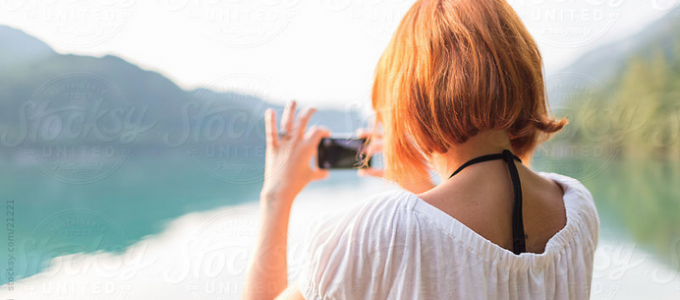Woman-Takes-Picture-with-Mobile-Phone-by-Mattia-Pelizzari---Stocksy-United---Royalty-Free-Stock-Photos